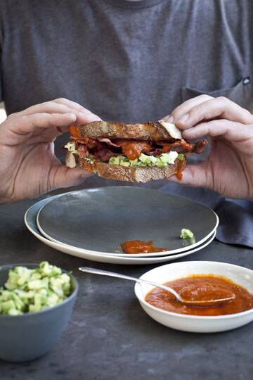 The perfect bacon sandwich with tomato sauce and Avocado and feta salsa.
SHD SUNDAY LIFE Picture by KATIE QUINN-DAVIES 
SLIFE121118