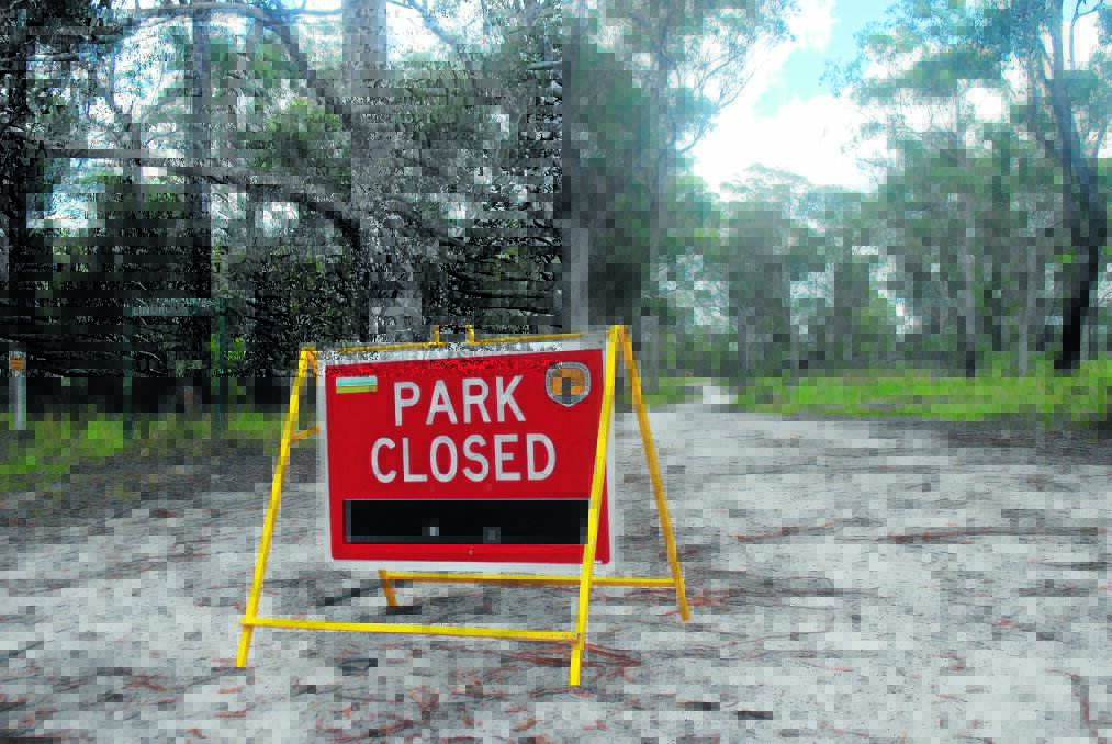 GRIM FIND: Road closures near a crime scene at Basket Swamp National Park after a decomposed body was found on the side of the road yesterday morning. Photo: The Tenterfield Star