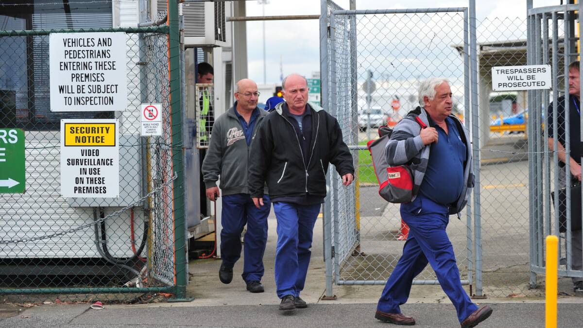 Workers leave the Broadmeadows plant in 2011 after job cuts were announced. Photo: WAYNE TAYLOR