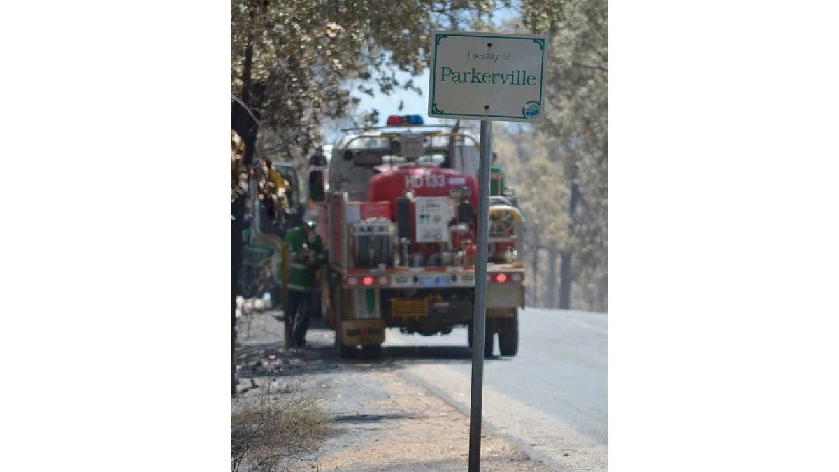 A bushfire burning out of control in the Perth hills has claimed one life and 52 homes. Pictures: DFES and Channel 10.
