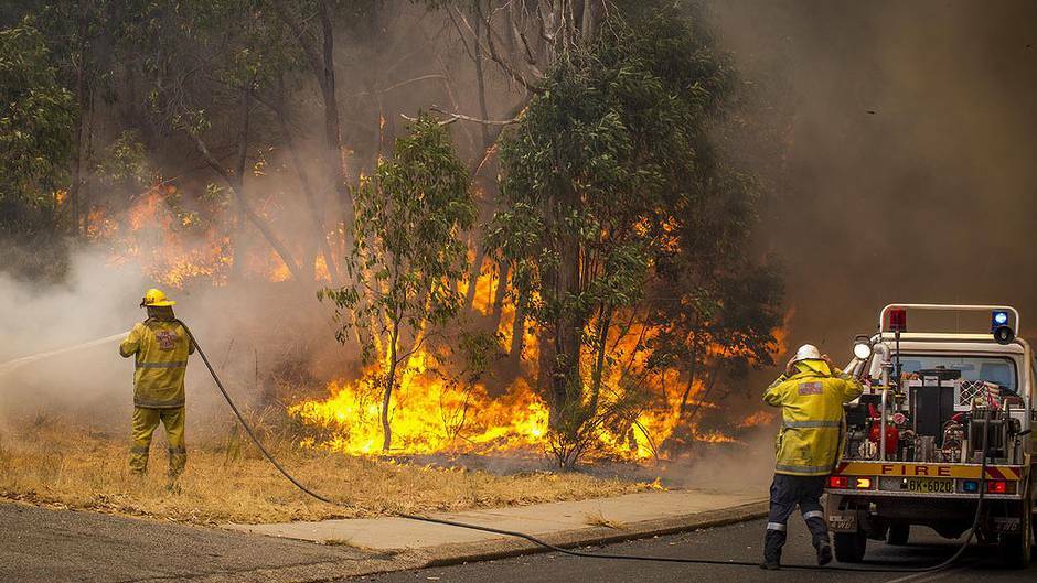 A bushfire burning out of control in the Perth hills has claimed one life and 52 homes. Pictures: DFES and Channel 10