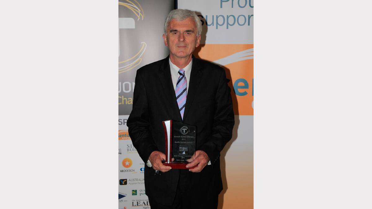Ken Brady from Bob Jane T-Mart in Tamworth with the business award for Motor Transport Sales and Service (small) at the Quality Business Awards held at TRECC on Friday night. Photo: Robert Chappel