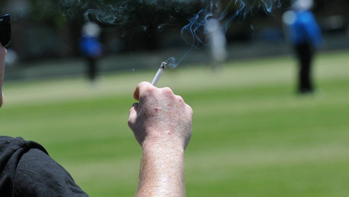 NO BUTTS: It’s now illegal for smokers to light up at sporting fields, playgrounds, public transport stations and other public places. Photo: Geoff O’Neill 060113GOC02
