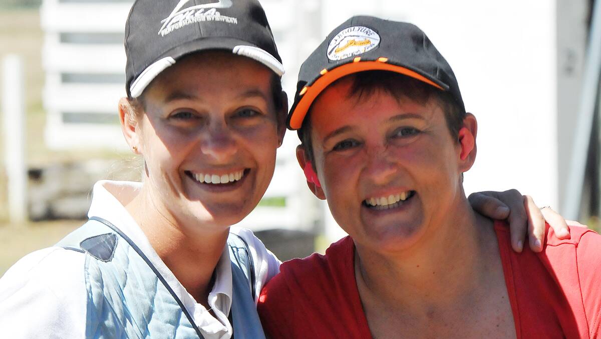 Female shooters Sarah Bennett (left) and Lorraine Hughes had plenty of success at the Tamworth Clay Target Club’s 35th annual shoot on the weekend. Photo: Geoff O’Neill 170313GOC03
