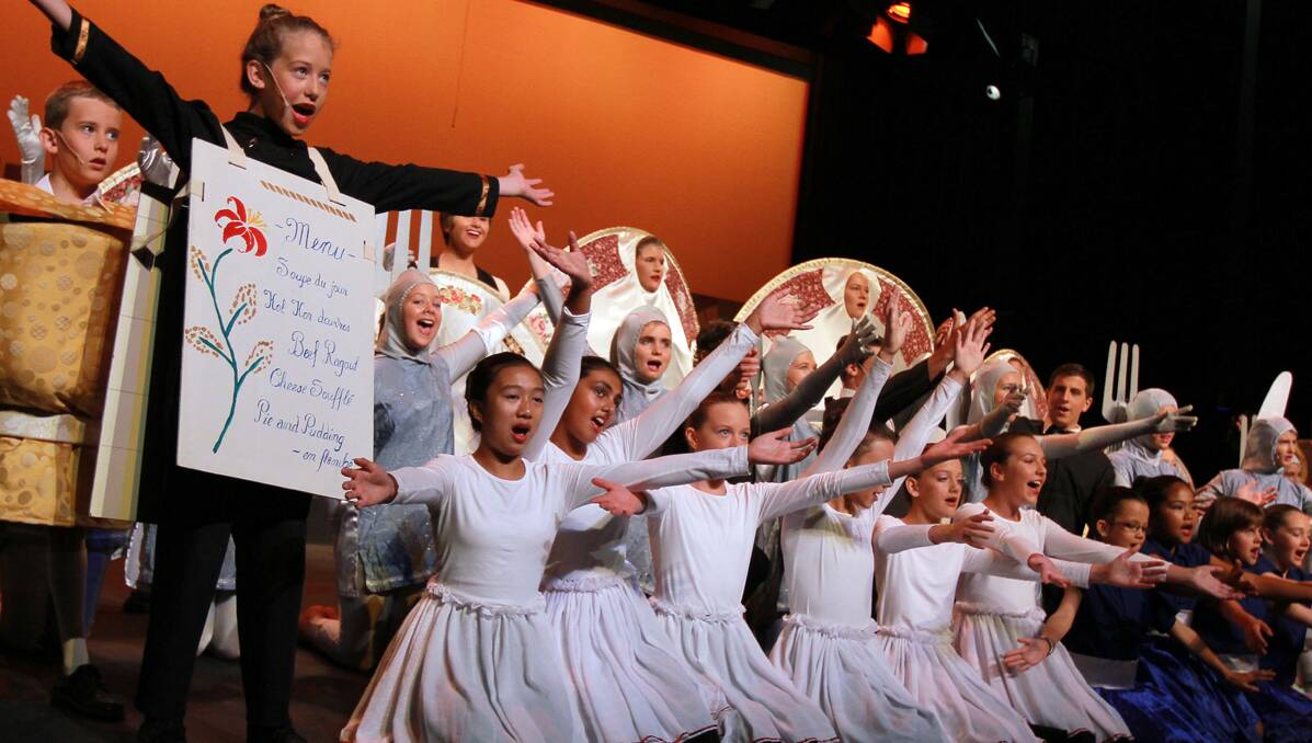 THAT’S SHOWBIZ: The cast of Carinya Christian School hold nothing back during yesterday’s  full dress rehearsal. Photo:  Robert Chappel 050313RCA08