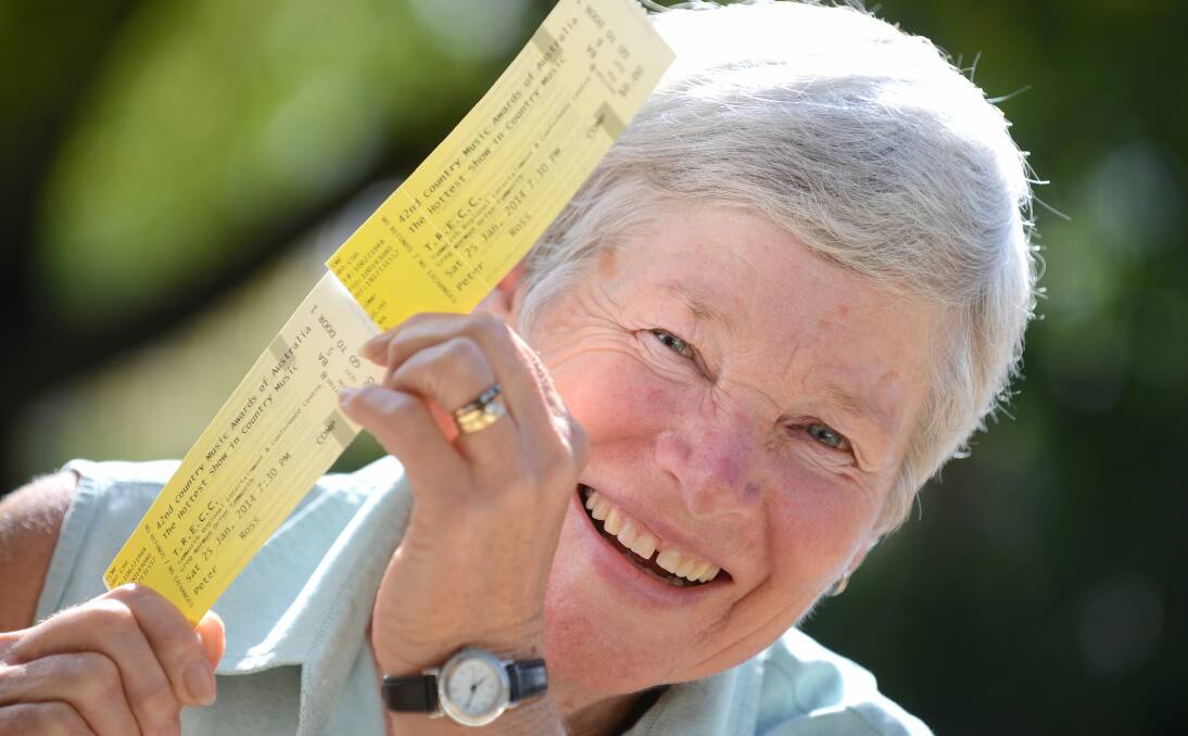 WINNING FEELING: Penny Turner with her winning tickets to the CMAA Country Music Awards of Australia. Photo: Barry Smith 080114BSF01