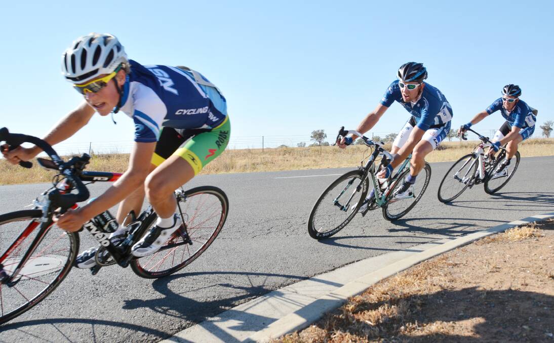 Sam Jenner leads Fraser Ashford and Phil Kelleher into this turn during last Sunday’s A Grade criterium at Goddard Lane. They’ll be out there again tomorrow morning. Photo: Barry Smith 020214BSA22