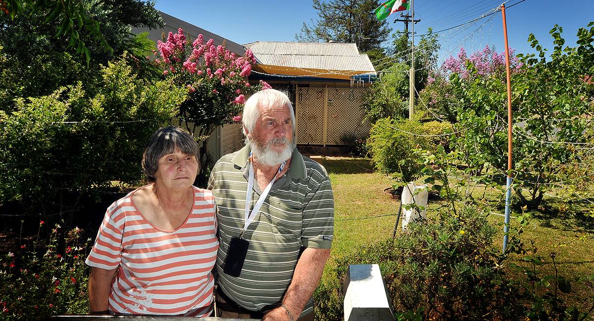 VICTIMS’ VOICE:  Morris and Annette Miller are devastated at the theft of war medals and other property from their Mathews St home on Christmas Day.  Photo: Gareth Gardner 271213GGBO1