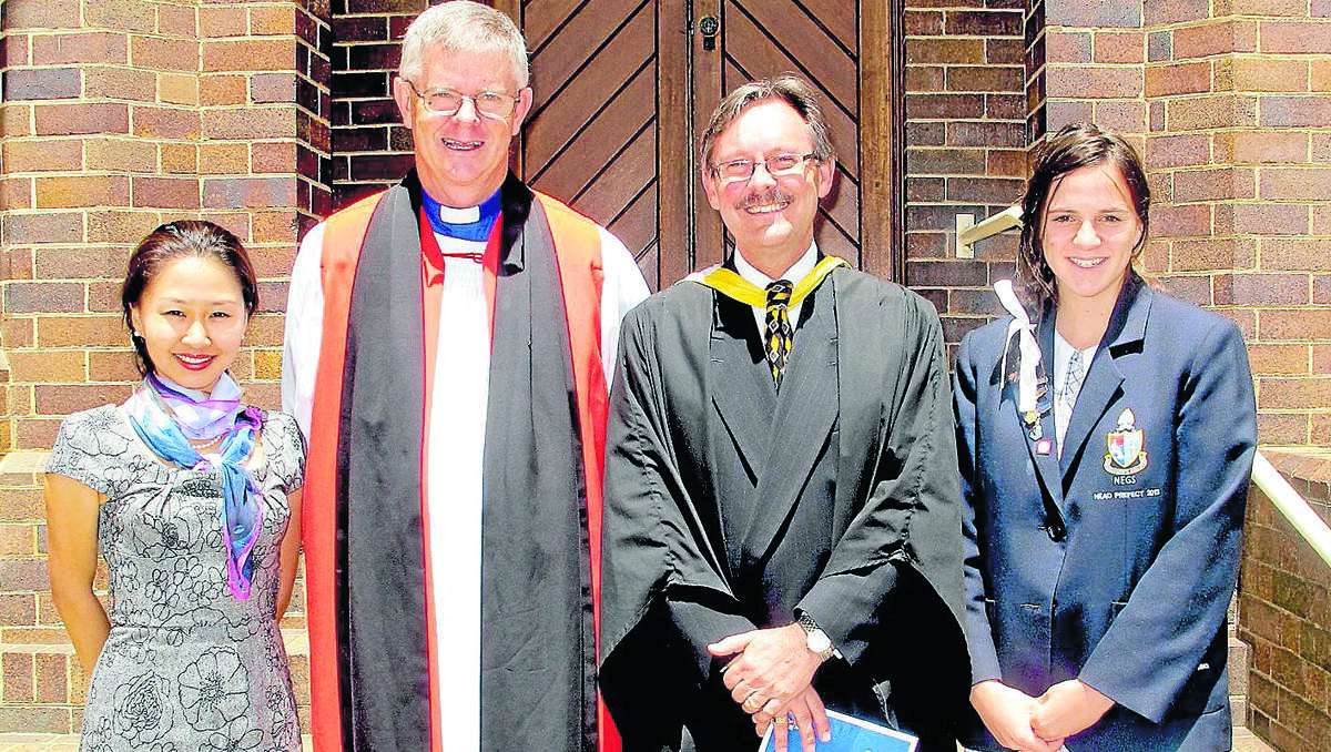 COMMISSIONED: New England Girls School chaplain Fiona May (left), Anglican Bishop of Armidale, Reverend Rick Lewers, newly commissioned school principal Clive Logan,and NEGS head prefect Molly McNeil. 