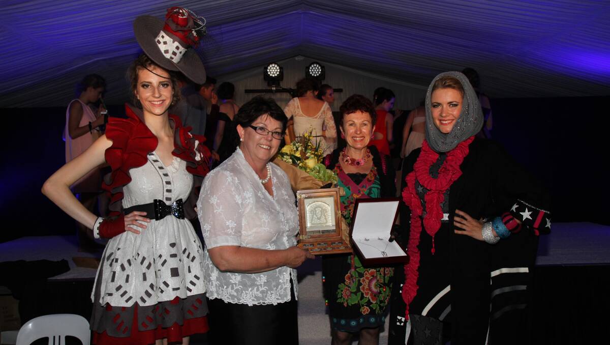 CLEAR WINNER: The Australian Wool Fashion Awards Supreme Award winner Laurel Judd, second from right, awards managing director Liz Foster and models Stephanie Murat and Annaliese O’Sullivan wearing the winning creations.