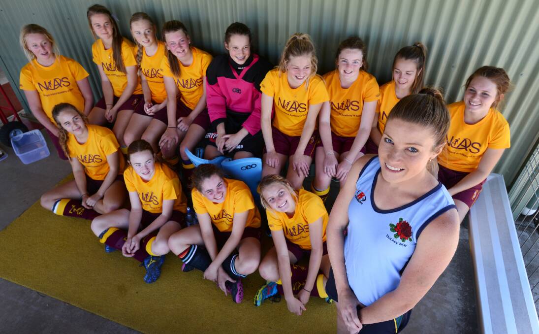Olympian Kate Jenner spoke with the NIAS hockey girls as part of their session yesterday. (Back from left) Maddie Atkin, Tahlia Rekunow, Talia Constance, Ashley Parker, Emily Jarrett, Alice Arnott, Emily Chaffey, Bree Curry and Tessa Pennefather;  (Sitting from left) KatrinaRekunow (trainee coach), Sarah Willis, Meg Whitten & Abigail Doolan.  Photo: Barry Smith  151213BSB22