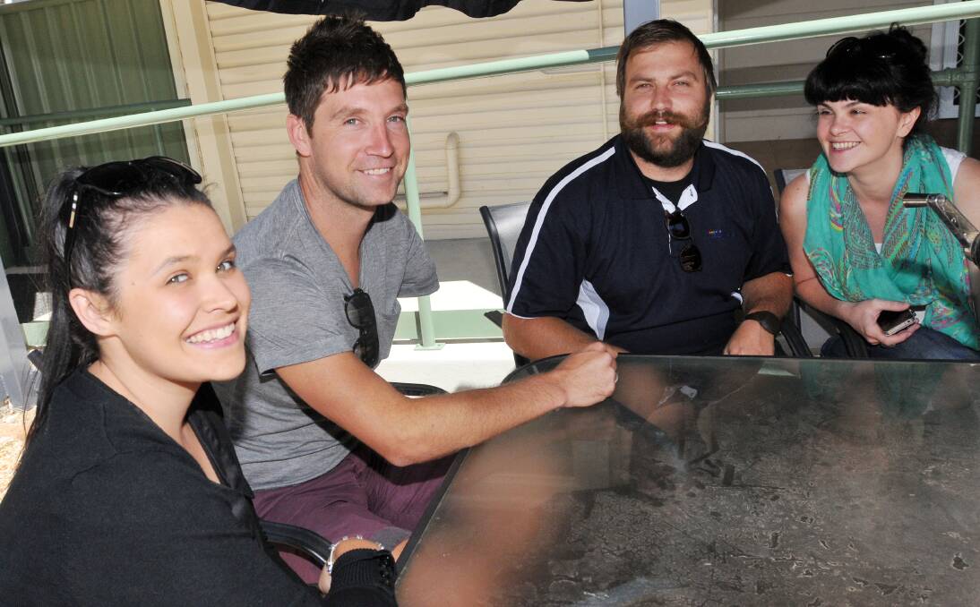 CHALLENGES: Paralympian Ben Austen, second from left, at headspace Tamworth yesterday with Bree Constable, Dan Wilson and Emilia Saban. O61213BOA02