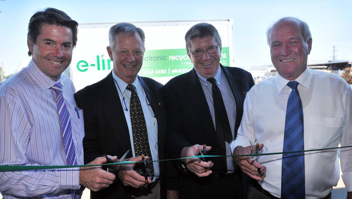 NEW VENTURE: Member for Tamworth Kevin Anderson, Joblink Plus chairman John Treloar, Tamworth mayor Col Murray and independent member for New England Tony Windsor at the opening of Tamworth’s E-waste facility in Lockheed St yesterday. Photo: Geoff O’Neill 191212GOA01