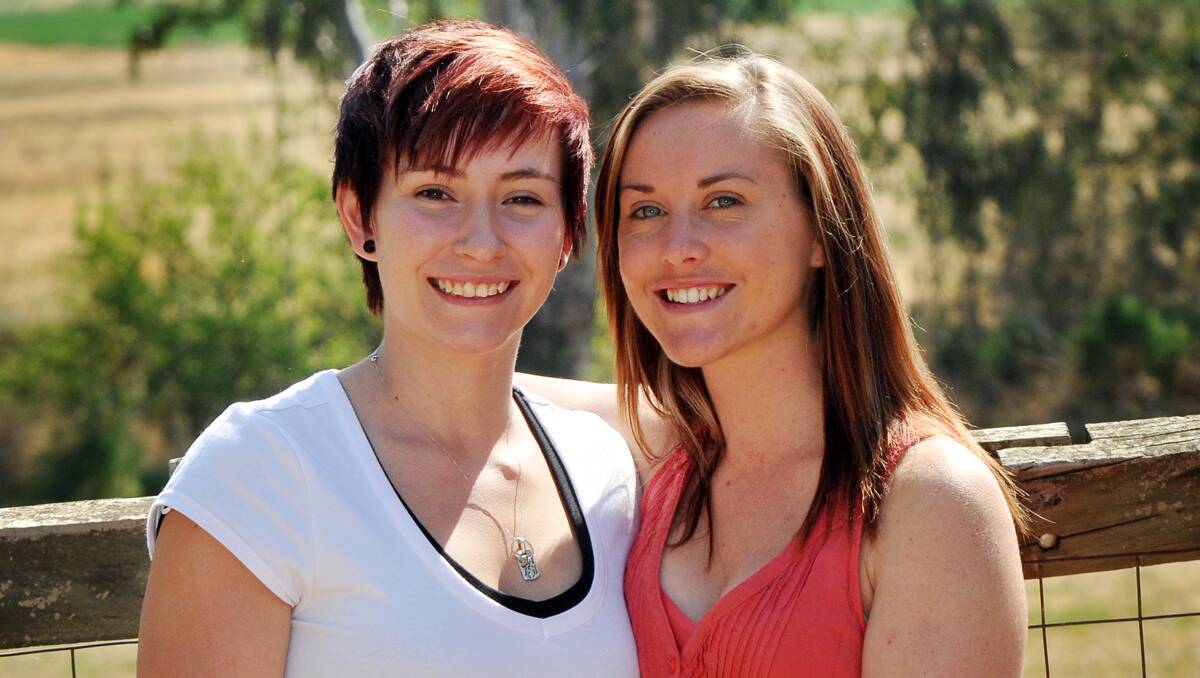 SARAH Mayo and Lucy McCowen are a young Tamworth couple in love, and are planning a wedding in March of next year. Photo: Geoff O'Neill 271013GOHo1