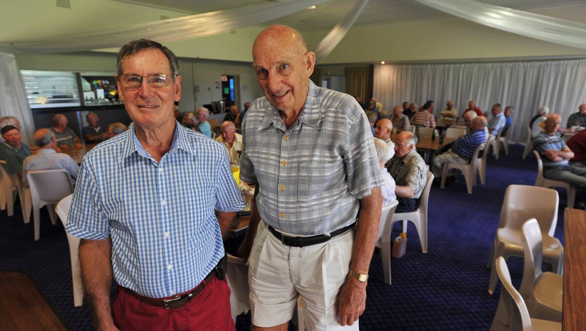 Hams Day winner Brian Hyslop (left) with Tamworth Seniors organiser Ian Trickett on Monday. Photo: Barry Smith 031212BSB01