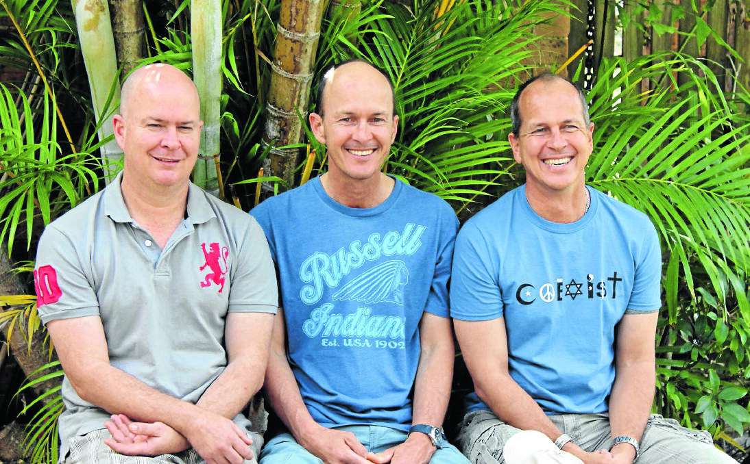 POLITICAL PRISONER: Peter Greste, far right, on a recent visit to Australia, pictured with his brothers Andrew, middle, and Mike.