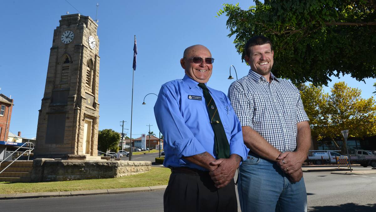 SPRUCED UP: Doug Hawkins, left, the Quirindi RSL Sub-branch president, and his Werris Creek counterpart, Chris Lyon, are pictured at the Quirindi War Memorial, all ready for today’s services. Photo: Barry Smith 230413BSC01