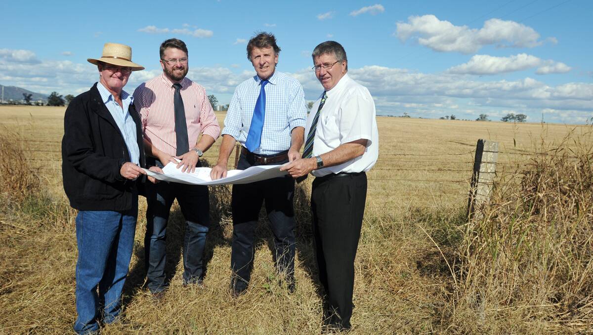 FOOD AND FUEL: From left, Geoff Hood, Luke Gerathy, Mark Martin and Tamworth mayor Col Murray on the site of the proposed grain refinery on Goddard Ln, near the old saleyards. Photo: Geoff O’Neill 090513GOD01