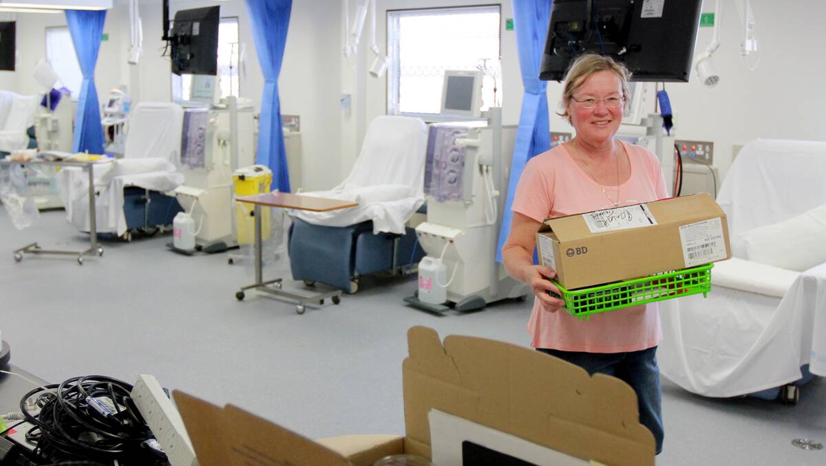 NEW ROOMY HOME: Tamworth Hospital renal unit nursing unit manager Mary Allen moved into their temporary building near the Emergency Department  yesterday. Photo: Robert Chappel 240313RCC03