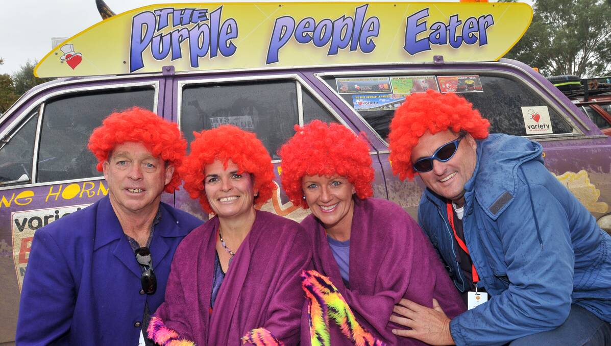 SNAPPY  DRESSERS: The Purple People Eaters team, from left, Greg Paff, Terri Patterson, Jillian Flynn and Ben Kelsall, turned a few heads with their colourful dress sense. Photo: Geoff O’Neill 220513GOC03