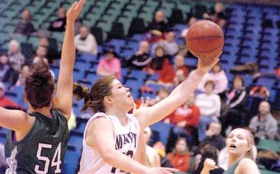 Minot State University senior Carly Boag from Tamworth looks to score inside against Bemidji State on Saturday at the MSU Dome. Boag finished with 25 points and 13 rebounds.
