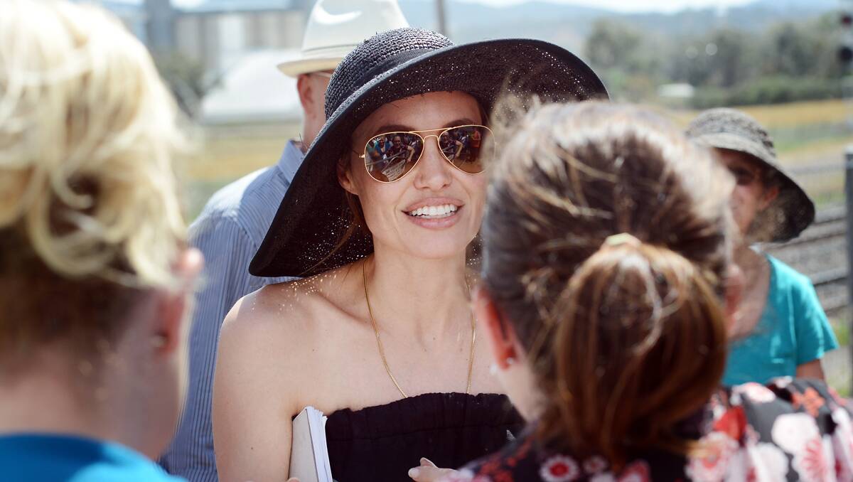 LOOK WHO’S BACK IN TOWN: Hollywood superstar Angelina Jolie revisited Werris Creek yesterday, delighting fans as she stopped to chat and have photos taken with them. 011013GGA21