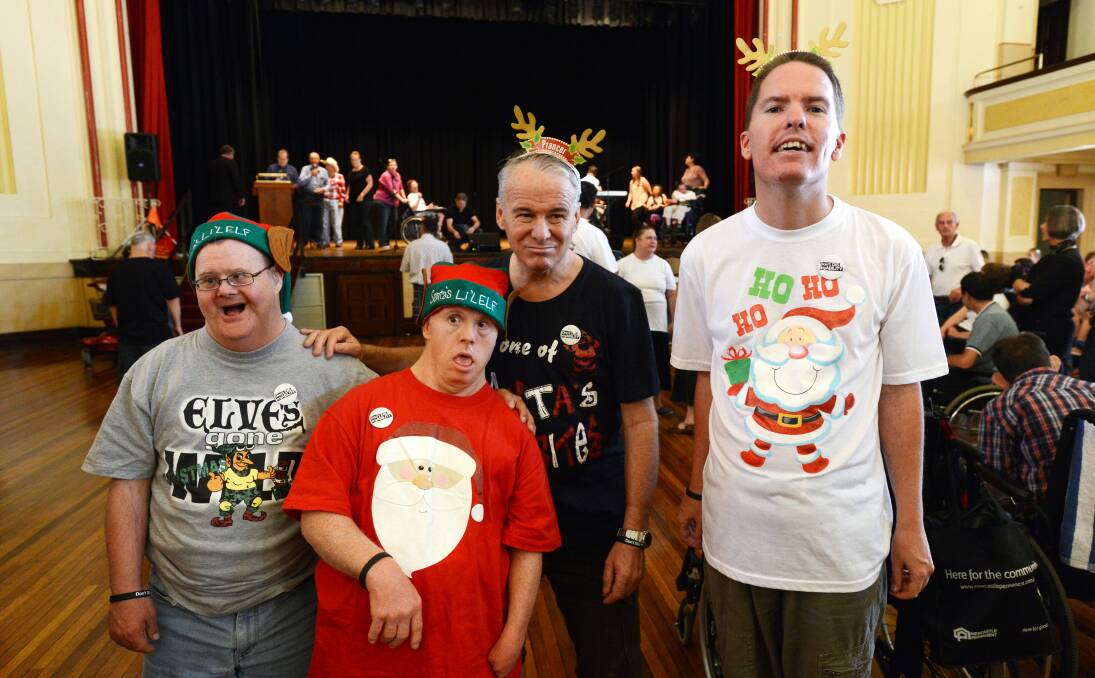 CELEBRATING ABILITY: From left, Johnny Yates, Rocky Pye, Mark Muller and Glen Pemperton, all from Quirindi, at the Tamworth Town Hall. Photo: Barry Smith 021213BSE01