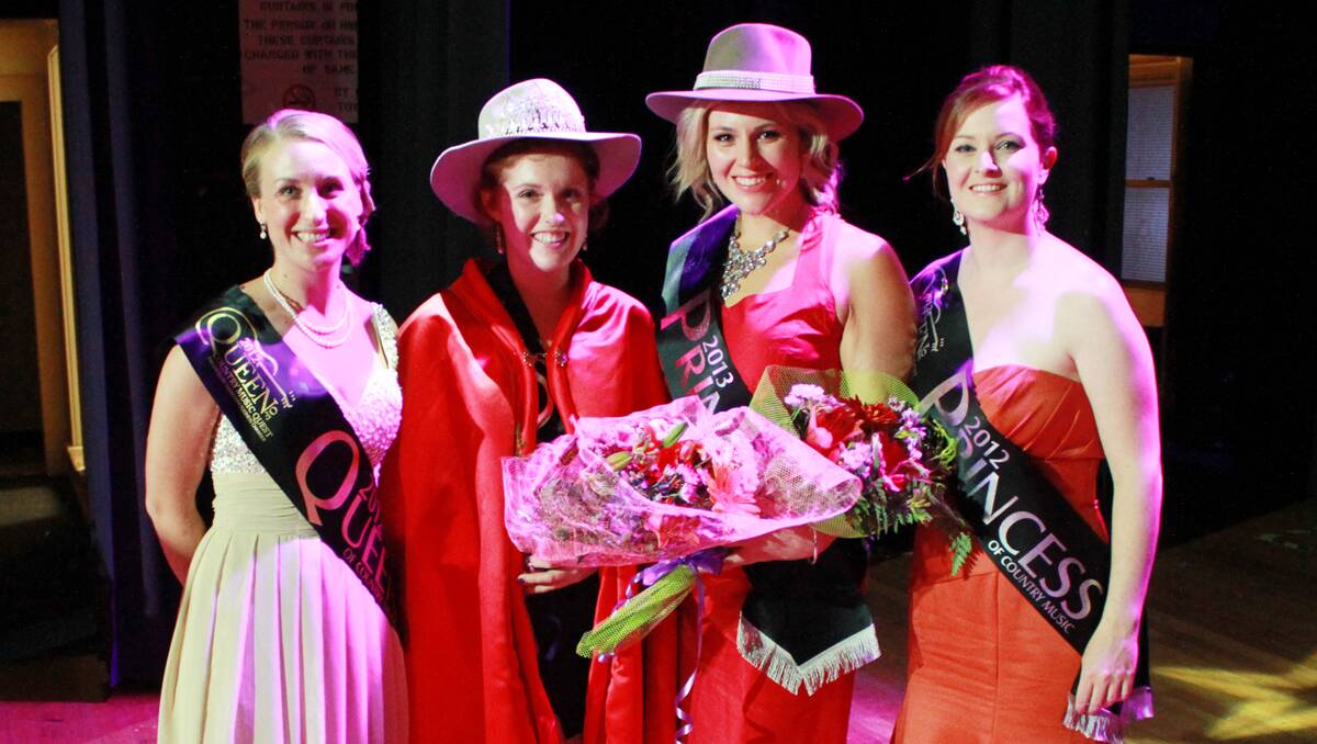 Handing over the crown is 2012 Queen Dimity Chaseling to 2013 Queen Sophie Dewhurst with 2013 Princess Kate Coburn joined by 2012 Princess Shae McIntosh. Photo: Gareth Gardner