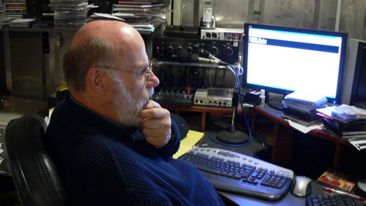 THE BIG 50: Nick Erby notched up 50 years on radio yesterday, October 16. Here he is  marvelling at the technology driving CMR Online from a computer in a shipping container direct to the world wide web on launch night, in August 2008. 
