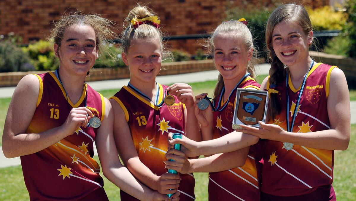 State All Schools athletics success for St Ed’s running stars (from left) Hollie Constable, Olivia Ruttley, Alyssa Jeffery and Laura Jeffery. Photo: Geoff O’Neill 221012GOD01