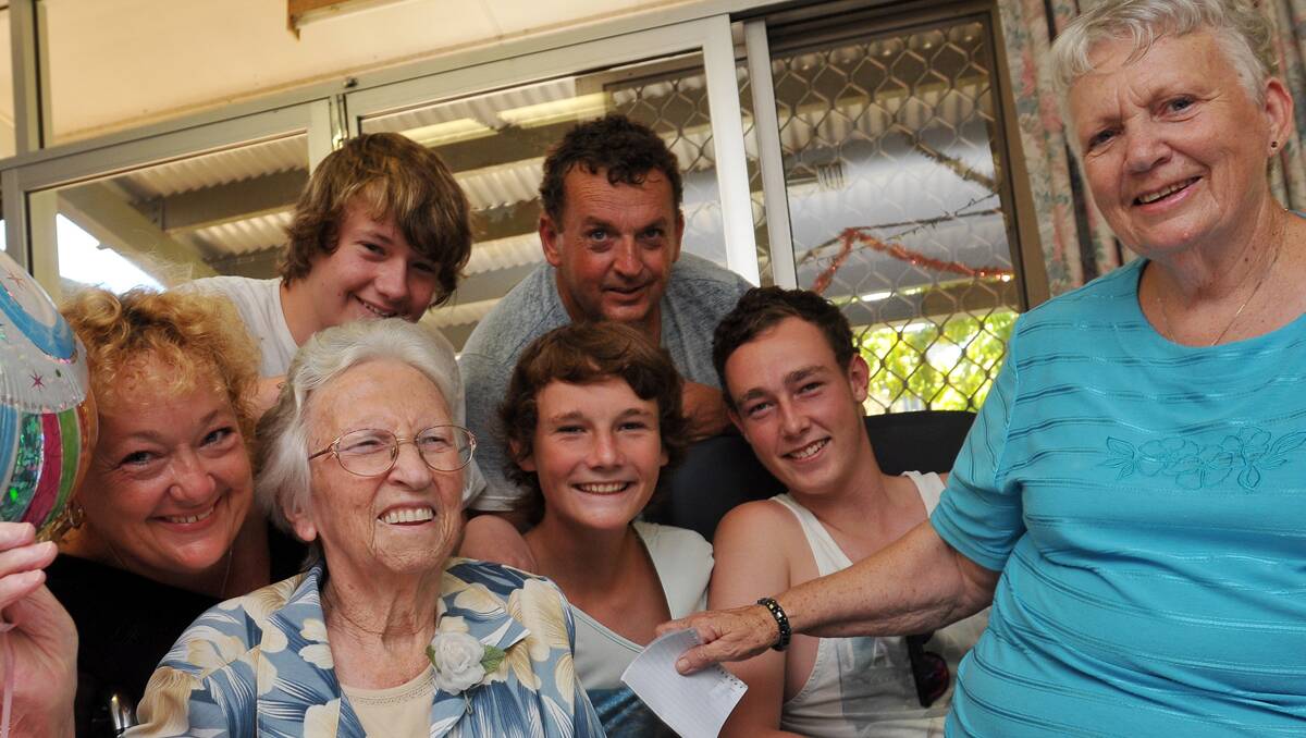 BETTER EVERY DAY: Gladys Giles with family, from left,  granddaughter Diane Watters, great grandsons Mitchell Watters and Kris Miller, grandson Garry Miller, great-grandson Cody Miller and daughter Janice Miller. Photo: Geoff O’Neill 030113GOD01