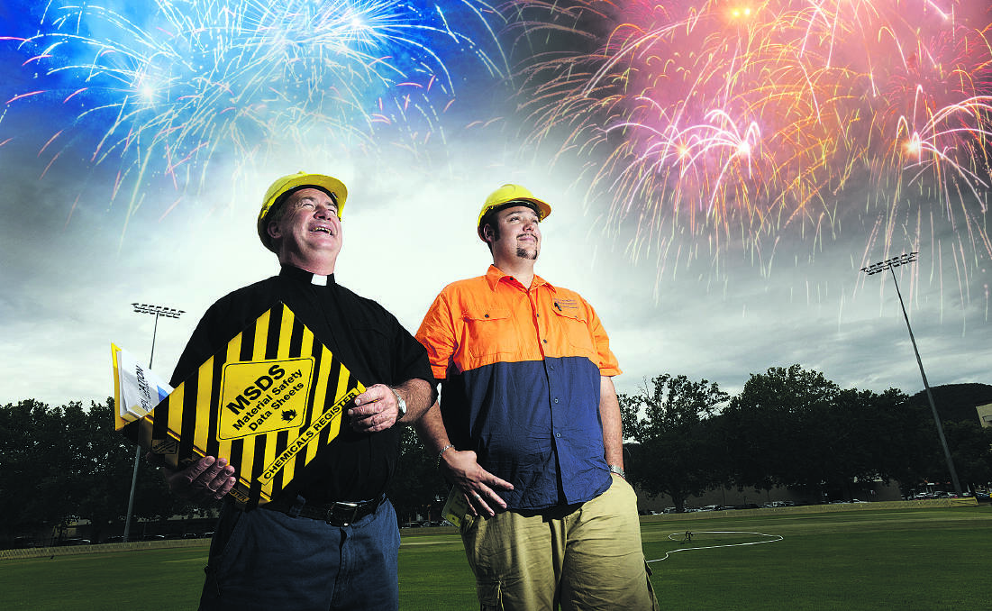 FIREWORKS DISPLAY: Father Anthony Koppman and Josh Marchant from Holysmoke Fireworks will be letting off the special effects at No. 1 Oval to open the festival.  Photo: Barry Smith 100114BSD04