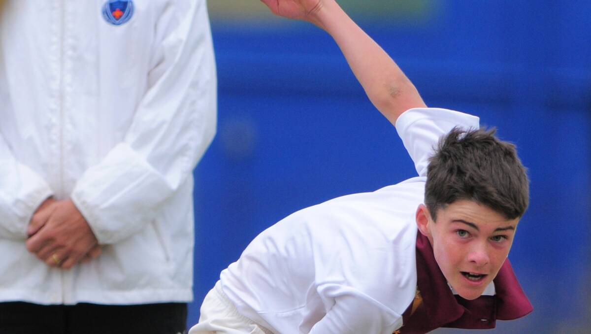 St Philomena’s Moree’s Patrick Montgomery bowls for his Polding side. They suffered their first loss of the State PSSA Carnival yesterday to just miss out on playing the final.   Photo: Barry Smith 201112BSC21