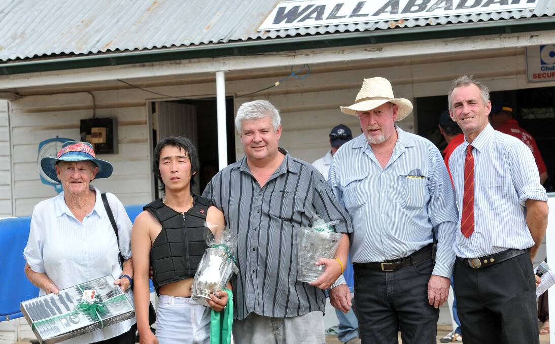 From left,  Norma Jurd (part-owner), Chle Lee (jockey) and Bruce Potter (part-owner) with the spoils of Stretch's Wallabadah Cup success yesterday. They’re with Mark Murphy (Maurice Murphy’s son) and Wallabadah Jockey Club president Bill Kelly. Photo: Gareth Gardner   010114GGE23