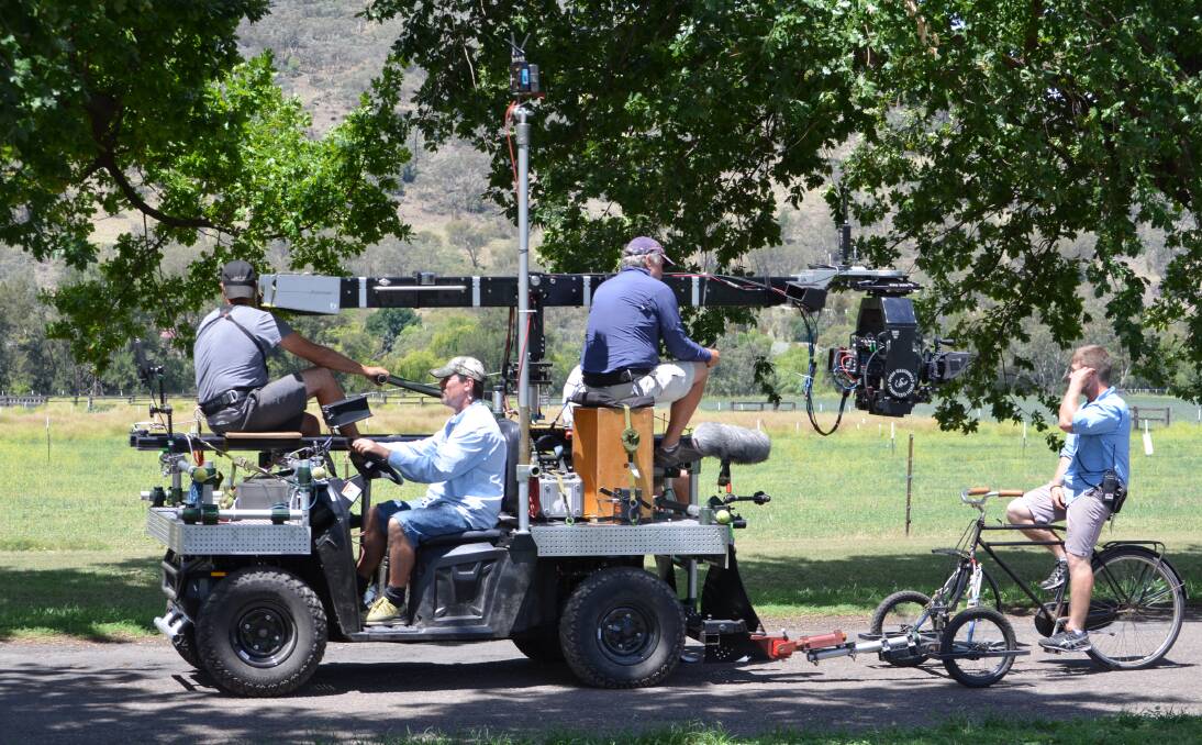 MOVIE MAGIC: The actor playing the young Louis Zampareni in the Angelina Jolie-directed Unbroken is captured by a buggy laden with cameras and crew.