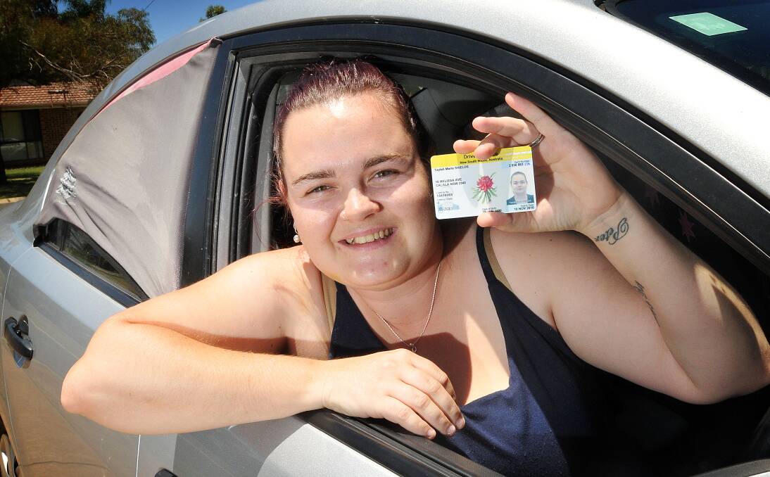 WINNERS ARE GRINNERS: Taylah Shields is one of thousands of locals who received a 50 per cent discount when she renewed her licence for being a safe driver. Photo: Gareth Gardner 311213GGC02
