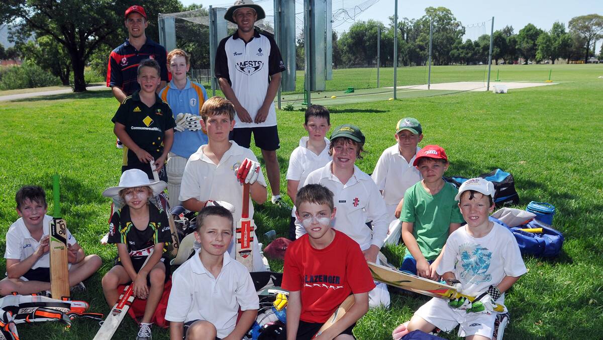 Waiting for their turn at yesterday's opening day of the Wests Cricket Camp (back row from left) Leo Steyn (coach), Mitch Holt (coach), (back standing from left) Will Benham, Noah Pitt (third row from left) Harrison George, Nick Mead, Will Tibbs, Hugo Barnes, Toby Markerink, Angus Davidson, Zak Cook (front from left) Thomas Sheppard, Joey Mead, Luke Maher. Photo: Geoff O'Neill 191212GOD01