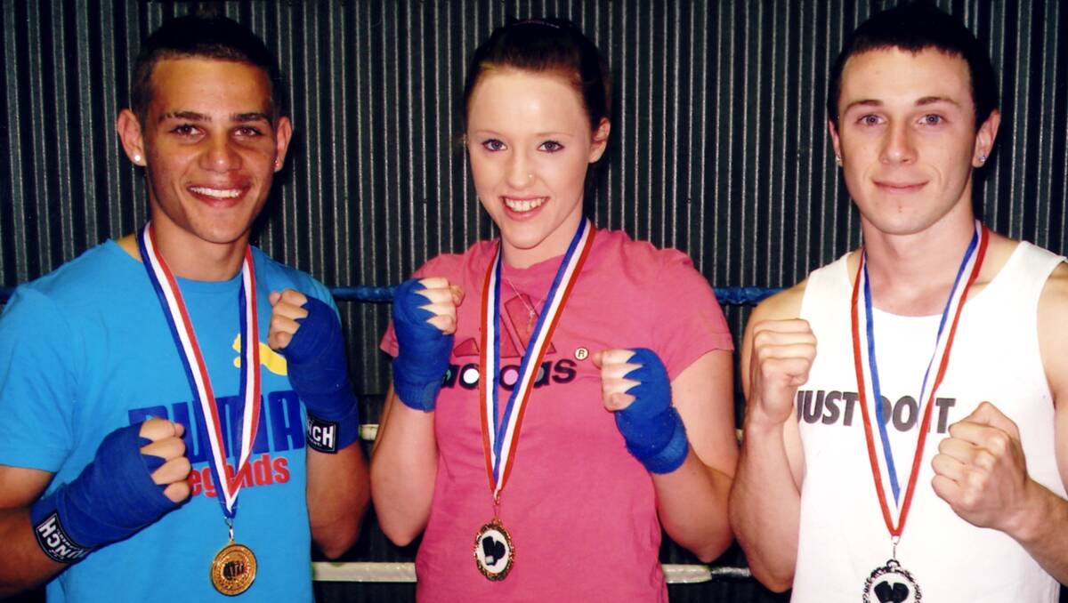 Lynken Dickson (left) , Anne-Marie Robinson and Brad Way with their state amateur boxing medals.