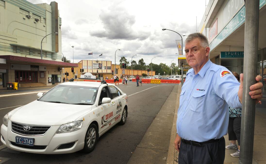 STREET BEAT: Brisbane St taxi rank security guard Craig Lucas has seen more sights than most during the festival. Photo: Gareth Gardner 240114GGA01