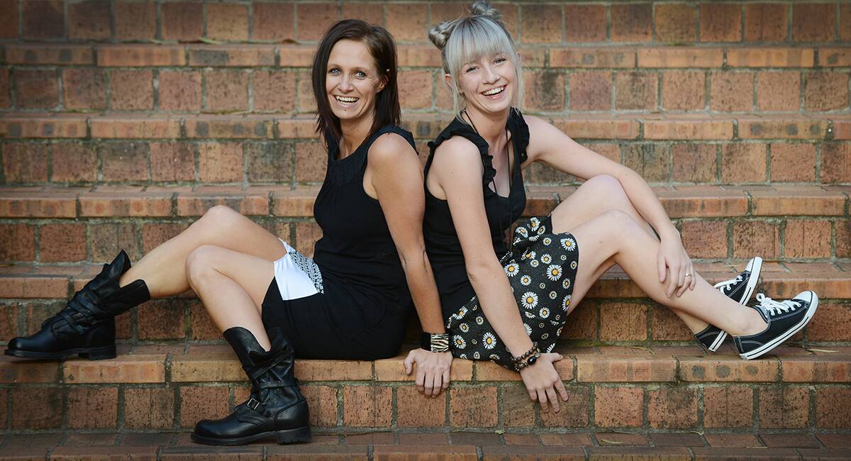 IT’S ON: Kasey Chambers and Ashleigh Dallas are heralding the start of the Tamworth Country Music Festival Official Countdown from today. Photo: Barry Smith 080114BSH02