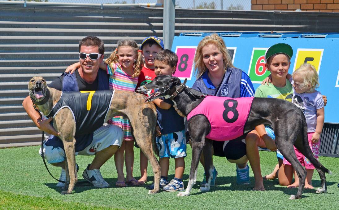 Gunnedah trainer Jamie Bush with last On Grass winner El Lethal and young admirers along with Dana Burns and fellow Gunnedah winner  Rip Stix after last Saturday’s era-ending Gunnedah grass meeting. Local greyhound racing attention turns to Armidale over the next three weeks for the  Armidale Cup Carnival and then returns to a new loam Gunnedah track . Photo: Christopher Bath 260114CB03