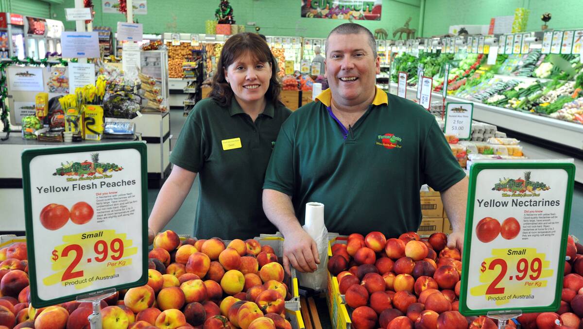 GOLD GREENGROCER: Farmer Bob’s owners Caryn and Stuart Rennie have been recognised for their quality and service. Photo: Barry Smith 041212BSB03