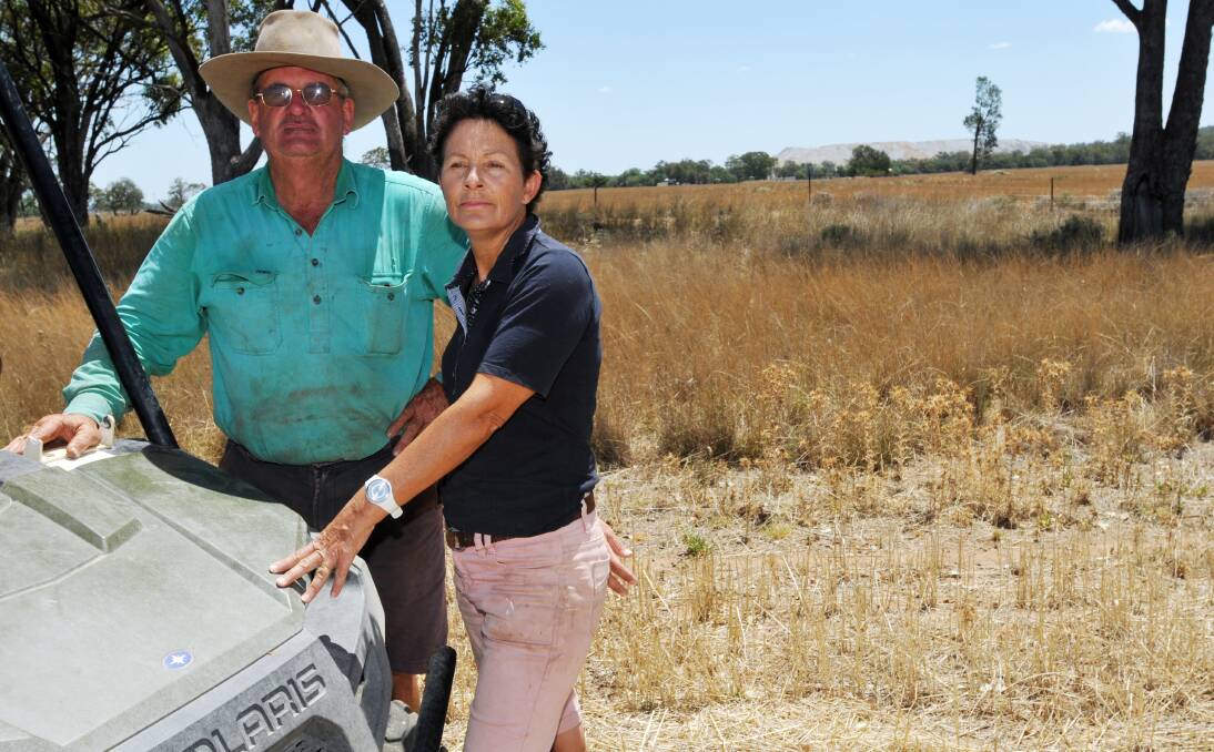 STUCK IN THE MIDDLE: Farmers Jim and Robynne Picton, whose Wean Valley property is surrounded by coalmines, fear the long-term implications for their health. Photo: Geoff O’Neill 311213GOF03