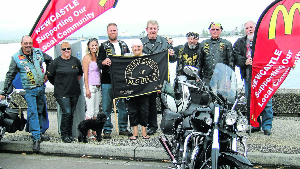 HERE TO HELP: United Bikers of Australia’s Newcastle chapter on the Newcastle foreshore before the start of last year’s three-day Flood Run.