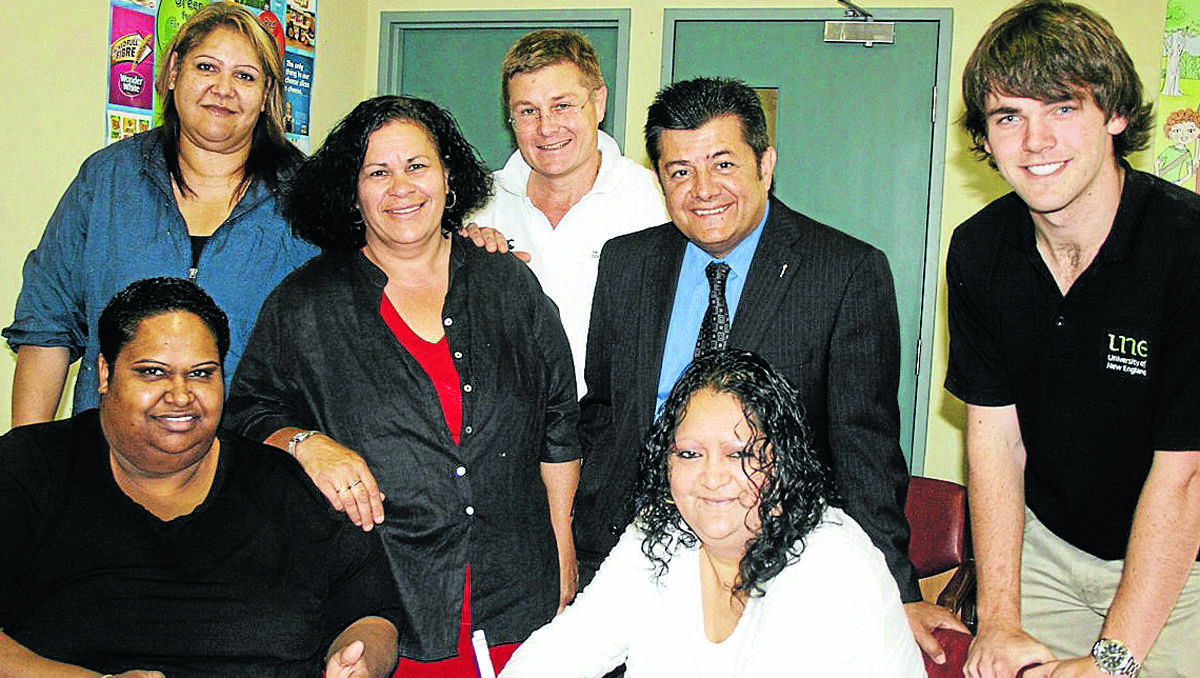 SIGNIFICANT: Cindy Blair, left, and Sancha Osci from the Department of Births Deaths and Marriages, Minimbah Principal Carolyn Briggs, Will Winter ( New England Mutual), member for Northern Tablelands Richard Torbay, Ruth Ahoy applying for a birth certificate for her grandson and Jason Artuso (SIFE).