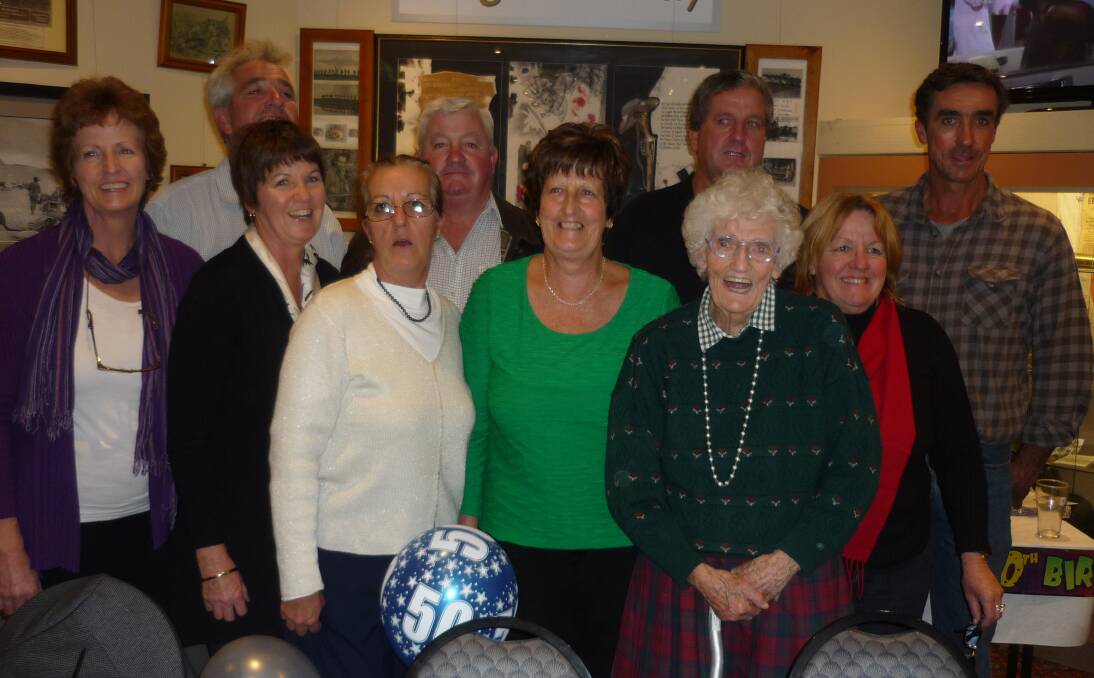 TAKEN IN 2013: Justine Payne, front, second from right, with nine of her children earlier this year – Jeffrey, back left, Michael, Brian and Peter. Jennifer, front left, Helen, Therese and Mary.