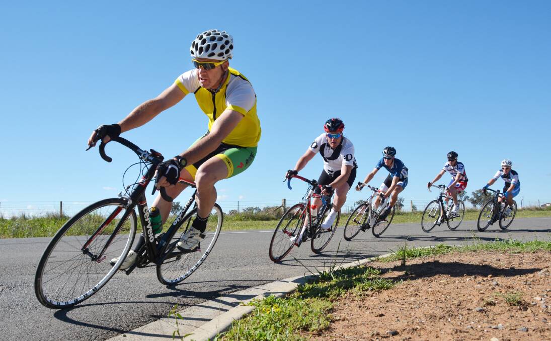 Tamworth Cycling Club president John Saunders was leading both on and off the criterium track on Sunday. Here he leads the B grade field followed by  Brendan Hallford, eventual winner Jack Pianta, Jay Clissold and Brad Roberts. Photo: Barry Smith 011213BSA10