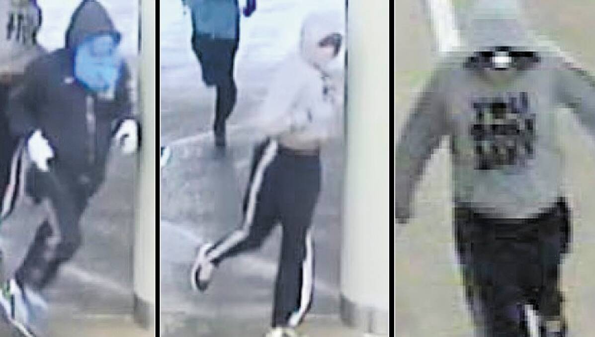 Security camera photos of three people wanted for Moree robbery.