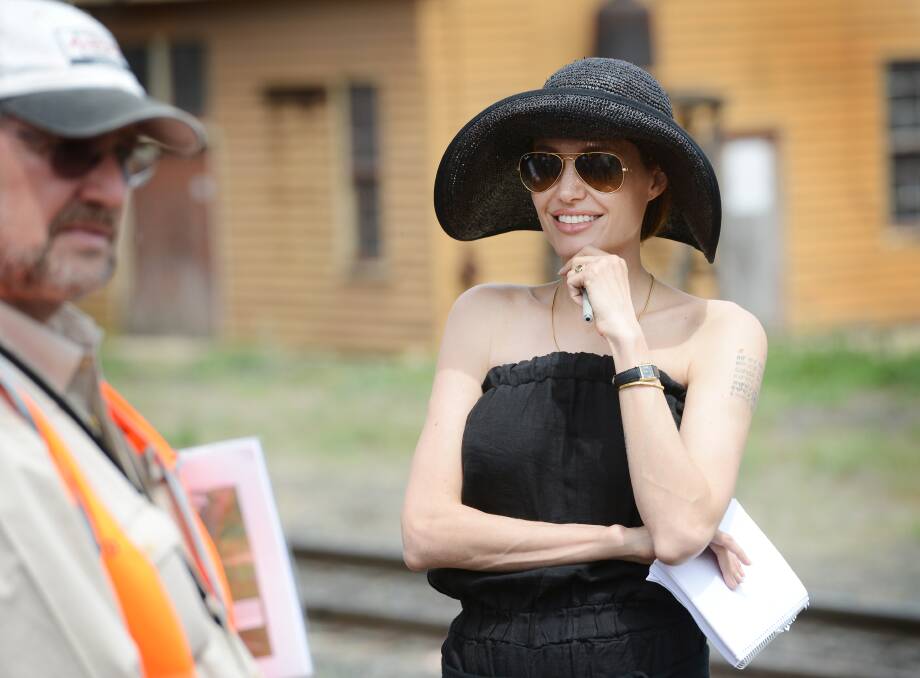 BACK TO WORK: Angelina Jolie swapped filming for shopping on Saturday but she's expected back on the set in Werris Creek today. Photo: Gareth Gardner 011013GGA12