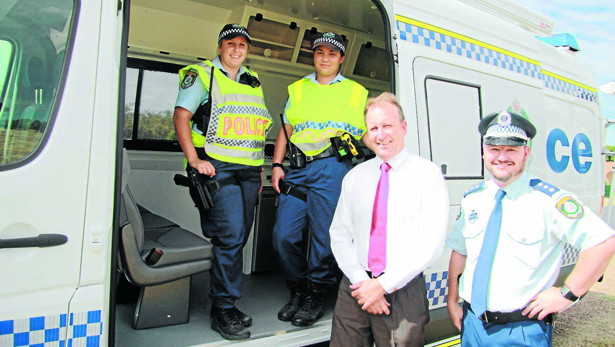 MOBILE UNIT: Barwon police, back left, Senior Constable Laura Keogh and  Probationary Constable Cody Hildrew, and Sergeant Robert Dunn, gave Barwon MP Kevin Humphries an inspection of the new mobile police vehicle in Moree.
